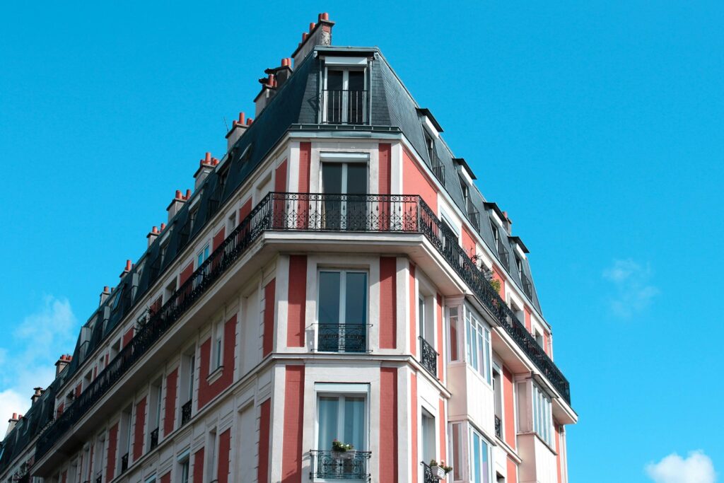 a very tall building with a clock on the top of it